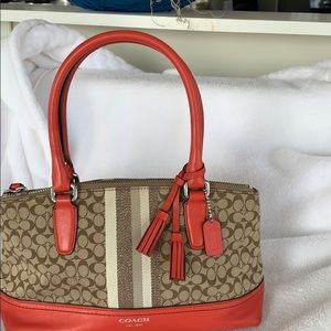 Coach handbag. Orange and tan.